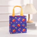 Blue non-woven gift bag with yellow handles featuring colorful cake patterns for parties - 9005-4 (Blue Cake-Eat Cake)