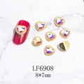 Detalle de dijes para uñas de corazón 8x7mm con borde dorado y diamantes iridiscentes - Marco Dorado-Corazón-Color AB(6908)