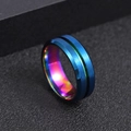 Macro detail of blue brushed stainless steel ring with vibrant rainbow inner plating - Rainbow and Blue