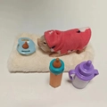 Detailed set featuring a mini silicone pig in pink hoodie with nursing bottles and pacifier - Style 5 Skin Color Pig with Accessories