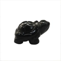 Polished black gemstone turtle figurine made of smooth stone or resin on white background - Obsidian 1.5 Inch