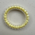 Yellow lucky four-leaf clover telephone cord hair tie with transparent spiral design - Yellow Core