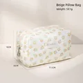 Floral mesh cosmetic bag in beige with yellow flower patterns and size dimensions - Pillow Bag / Beige