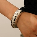 Polished silver zinc alloy bangle with hammered texture and black fluid art pattern - Shiny Irregular Black Coated Bangle (A-825) / Silver