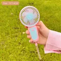 Portable mini USB hand fan in cute pink and blue with size markings and a wrist strap - Pink