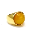 Macro detail of a gold-plated stainless steel ring with a yellow cat-eye gemstone center - US 11 / Gold Yellow Cat Eye Stone