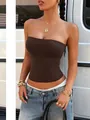 Slim fit dark brown Y2K tube top in elastic fabric paired with light wash blue jeans - S / Coffee