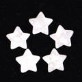 Detailed view of five white marbled stone stars arranged in a circle on black background - White Jade