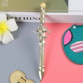 Golden sword-shaped creative gel pen with intricate magical style relief and yellow bead - Bead Sword - Gold / 0.5mm