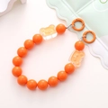 Detail of orange resin bead phone charm with cute bear charms and dual metal rings - Orange Bear Style (K1669)