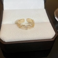 Detailed close-up of a layered 18K gold bow ring with small pearls and crystals in a box - Multi Layer Pearl Gemstone Ring (8#)