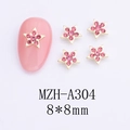Detailed view of pink rhinestone star nail charms with 8x8mm gold metal base - Golden Solid Star Pink Stone (A304)