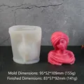 Silicone mold for goddess bust candle showing tool dimensions and finished pink plaster result - Saudi Arabian Girl