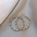 Orecchini a cerchio a C color argento con finitura geometrica e trama a increspatura - Cerchio Argentato (5#)