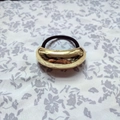 U-shaped hair tie with large curved golden metallic charm on a minimalist black elastic - Gold Large
