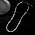 Detail of woven triple layer stainless steel snake chain with lobster clasp and extension - Silver Necklace