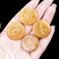 Four natural yellow crystal agate stones with golden archangel symbols in hand display - Set of 4 / Yellow Jade
