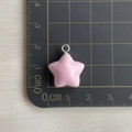 Pink resin star pendant with eyelet measuring 1.8cm on a metric scale background - Pink Star Charm