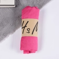 Hot pink cotton linen scarf rolled with kraft paper packaging on a white surface - Light Rose Red / One Size