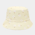 Detailed view of yellow floral bucket hat with white daisy prints and reinforced stitching - Light Yellow Daisy Style
