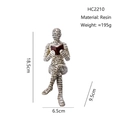 Soggettoprendi libri nordico in resina, figura che legge con lettere, vista altezza 18,5cm - Ornamento di Lettura Lettere HC2210