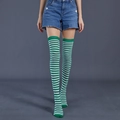 Detailed view of green and white striped over-knee socks in high-quality knitted cotton - Green & White Thin Stripes