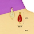 Detail of red enamel leaf charm showing dimensions 22x8.5mm and 1g weight specs - Red Leaf