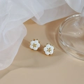 French style floral stud earrings with white petals and gold star center detail - White Flower Gold Star Studs
