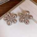 Elegant silver flower stud earrings with beaded petal edges on white texture display - Polished Flower Bead Grain Stud Earrings (36#) / Silver