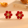Close-up of red flower stud earrings with cat eye stone and gold base set on warm background - Gold Red Cat's Eye Stud Earrings
