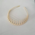 Minimalist beige plastic headband with inner teeth for secure grip and daily hair styling - Off-white