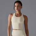 Sujetador deportivo crema sin costuras con tela elástica y diseño de ajuste ceñido - S / Marfil Claro