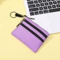 Porte-monnaie violet en tissu avec trois fermetures éclair et un anneau porte-clés - Violet