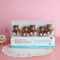 Five pieces of 3cm brown bear birthday candles in clear packaging on pink background - Bear Candle