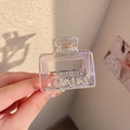 Iridescent laser finish medium square hair claw clip held against light background - Small Cube / Iridescent Transparent