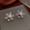 Boucles d'oreilles flocon de neige en argent avec zircons et logo orb sur écrin à bijoux - 97# Tige en Argent - Boucles d'Oreilles Orb Saturne Flocon de Neige Argentées