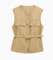 Detail of gold tweed vest with decorative embossed metal buttons and matching belt - Khaki