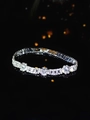 Elegant silver bracelet with sparkling zircon flower clusters on reflective black surface - Silver Flower Cluster Style
