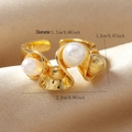 Macro shot showing wavy golden open ring dimensions with pearls and textured spheres - Pearl Gold Ball Wave Ring