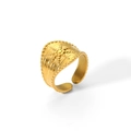 Detailed view of wide 18K gold plated stainless steel ring with radial star texture - Tr4050