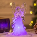 Leuchtende Acryl-Engelsfigur mit lila LED-Licht auf Schneebasis für Weihnachtsdekoration - Engel mit erhobener Hand / Lila