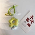 Ciondolo borsa a fiori gialli con cinturino verde ondulato e moschettone giallo - Ciondolo Fiore Verde