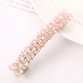 Detailed view of pink faceted crystal bead hair clip with silver spring metal clasp - Pink