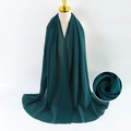Solid dark green pearl chiffon hijab scarf for women showing fabric texture and drape - Dark Green
