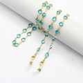Fashionable gold eyewear chain with light blue crystal beads and non-slip silicone rings - 70cm / Bezel Lake Blue Glass
