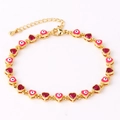 Detail of adjustable gold-tone bracelet with red and pink evil eye heart-shaped charms - 18K Gold / Rose Red