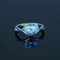Luminous heart ring in stainless steel with blue glow inlay and crystal on black surface - US 8 / NY797 Couple Heart with Zircon