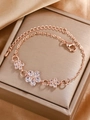 Rose gold flower bracelet with clear zircons and adjustable chain on jewelry box - Rose Gold Diamond Three Flowers Bracelet (S521)