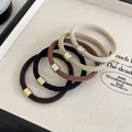 Five elastic hair ties in earthy tones with matte gold metal accents on a tray - 1# Old Money Style Simple Hair Tie 5 Pcs Set