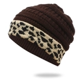 Winter knitted beanie in dark brown featuring a stylish leopard pattern jacquard band - One Size / Coffee